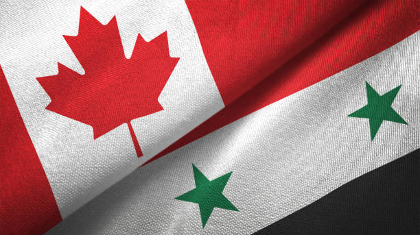 istock Syria Syrian Arab Republic and Canada two flags together realations textile cloth fabric texture 1089930970