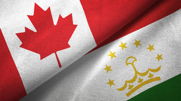 istock Tajikistan and Canada two flags together realations textile cloth fabric texture 1089931032