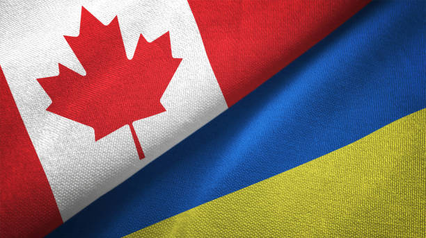 Ukraine and Canada two flags together realations textile cloth fabric texture Ukraine and Canada flag together realtions textile cloth fabric texture ukrainian flag photos stock pictures, royalty-free photos & images