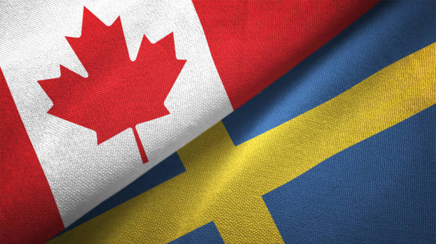 istock Sweden and Canada two flags together realations textile cloth fabric texture 1089931092