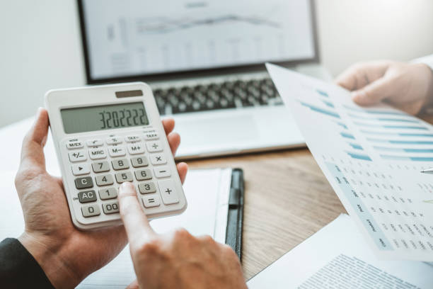 istock Co-working Business Team meeting Planning Strategy Analysis investment and saving concept. meeting discussing new plan financial graph data on Laptop. 1089940214