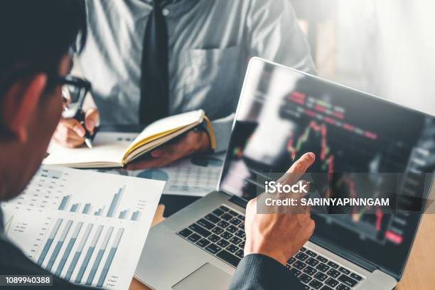 Business Team Investment Entrepreneur Trading Discussing And Analysis Graph Stock Market Tradingstock Chart Concept Stock Photo - Download Image Now