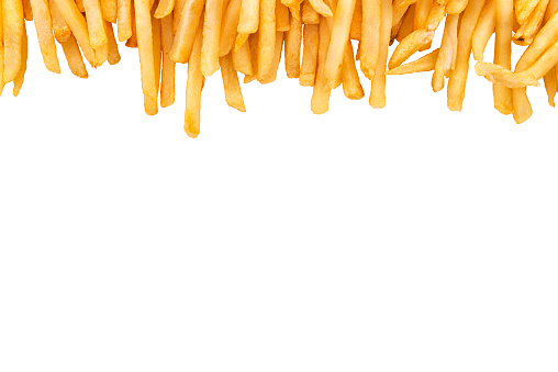 French fries isolated on white background, directly above. Close up.