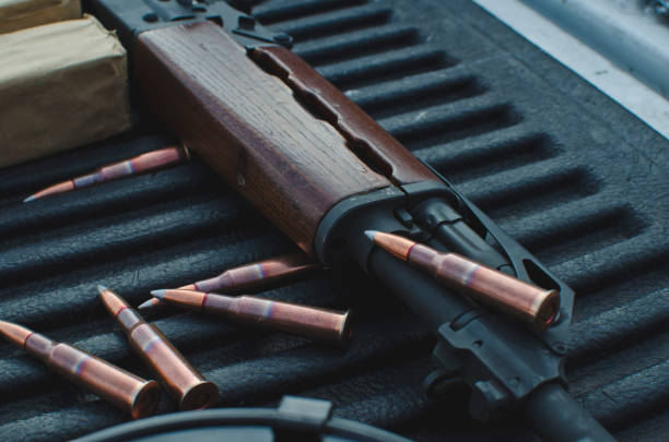 istock The old ak47 and bullet on the range 1089974348