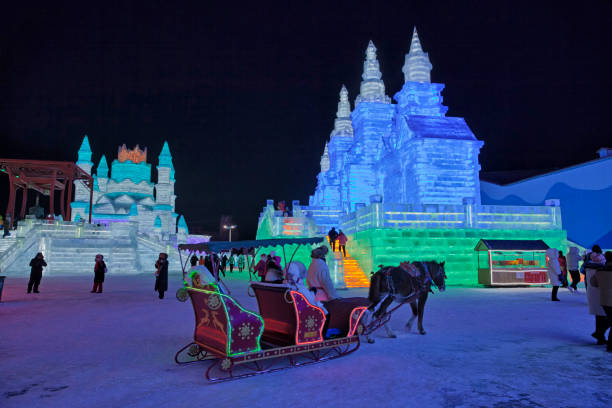 January 21, 2025, Changchun, China, figures and colored lights made of ice sculptures on Xinmin Street in Changchun during the festival.
