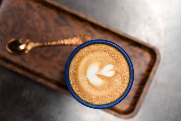 hot cappuccino in rusty vintage background - coffee top view imagens e fotografias de stock