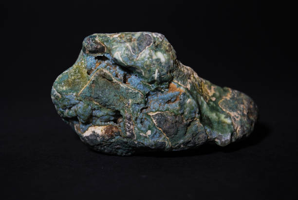 istock Chalcedony natural rough stone on a black background 1090004172