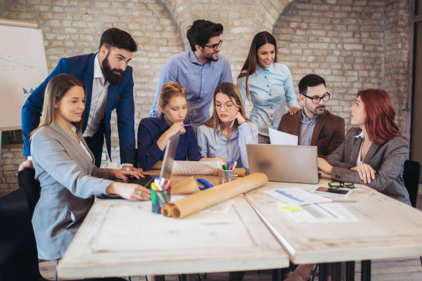 istock Business people working in office together. Team work in office. 1090006914