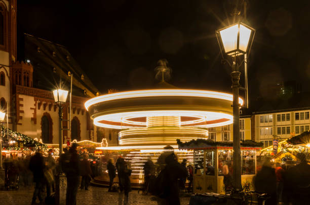 Herne, Germany - August 12th 2012: Kids, Couples and Families enjoy a ride on the carousel at the famous fun fair \