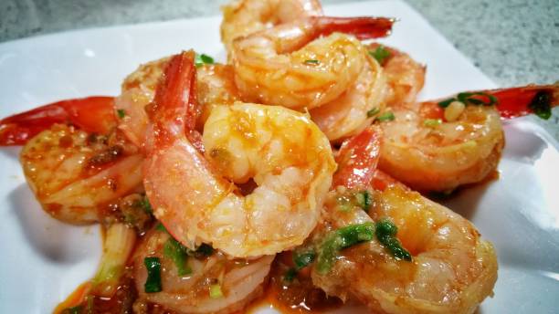 istock Freshly cooked shrimps in ketchup sauce served on a plate 1090014066