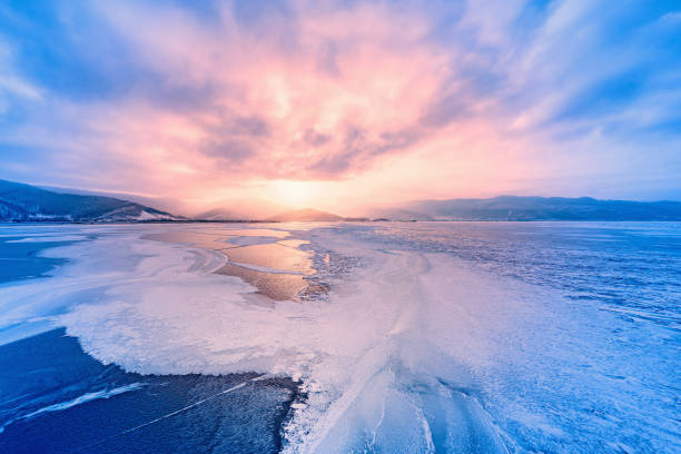 istock Frozen surface of Baikal lake at sunset. 1090024496
