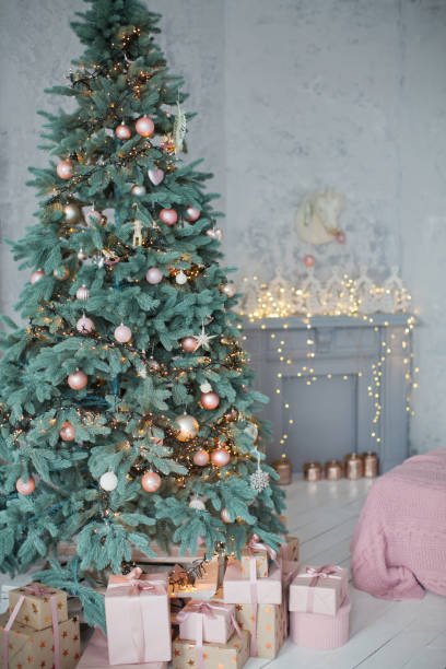 istock Christmas tree with pink and gold decorations 1090024772