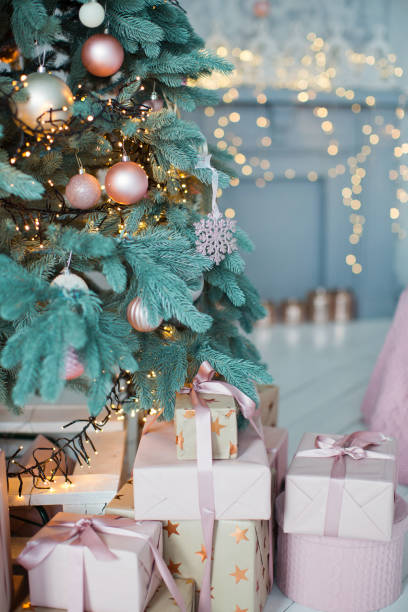 istock Christmas tree with pink and gold decorations 1090024808
