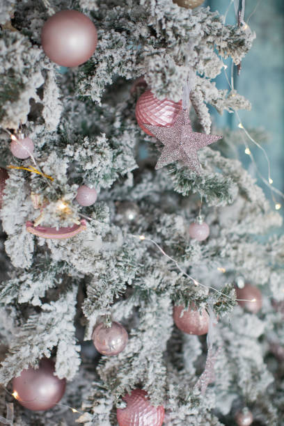 istock Christmas tree with pink and gold decorations 1090024882