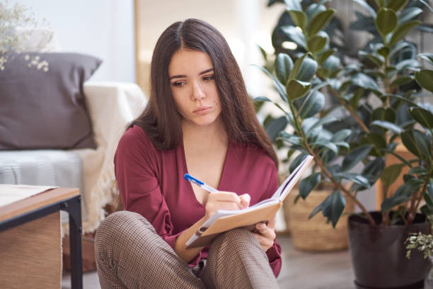 istock Woman Thinking Dreaming Concentration Project Concept 1090026602