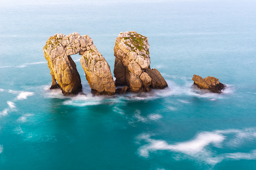 Sea Gate (or Canto del Diablo) at Broken coast, Liencres in Cantabria Spain
