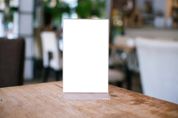 istock Menu frame standing on wood table in Bar restaurant cafe. space for text marketing promotion. 1090035066