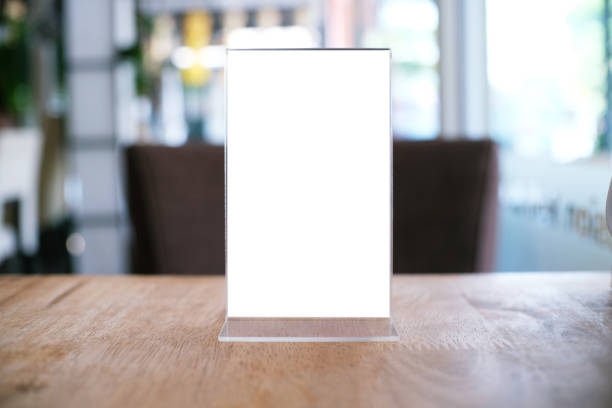 istock Menu frame standing on wood table in Bar restaurant cafe. space for text marketing promotion. 1090035068