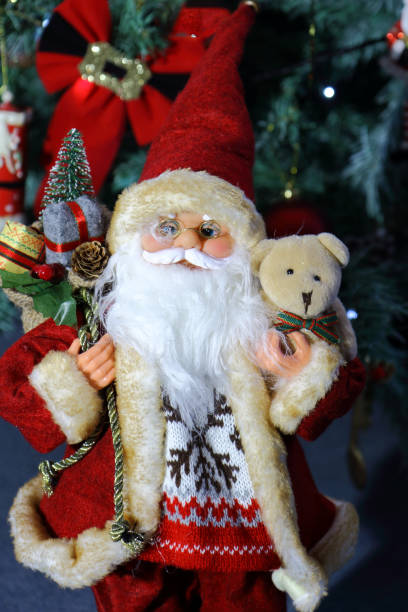 istock Santa Claus in front of a tree 1090038736