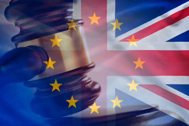 istock Court gavel strike with EU and UK flags concept 1090057136