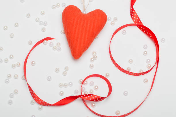 cute red heart on a white background for a greeting card