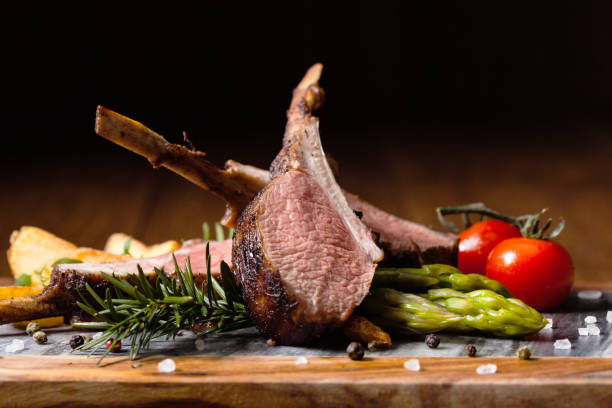 istock Baked lamb loin, served with asparagus. 1090064662