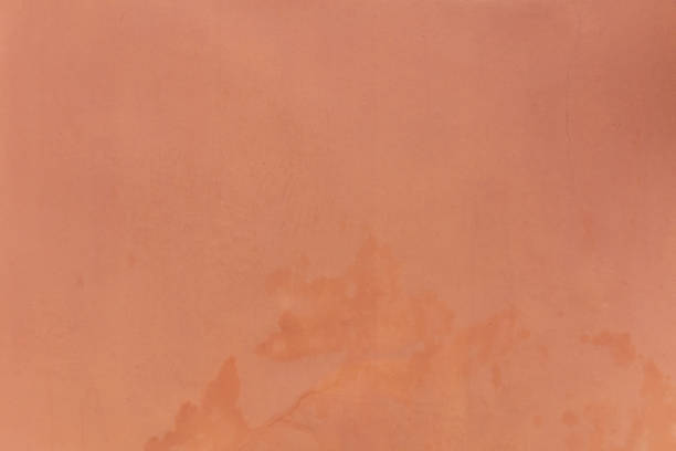 istock Orange color, stucco painted wall texture grunge background 1090068730