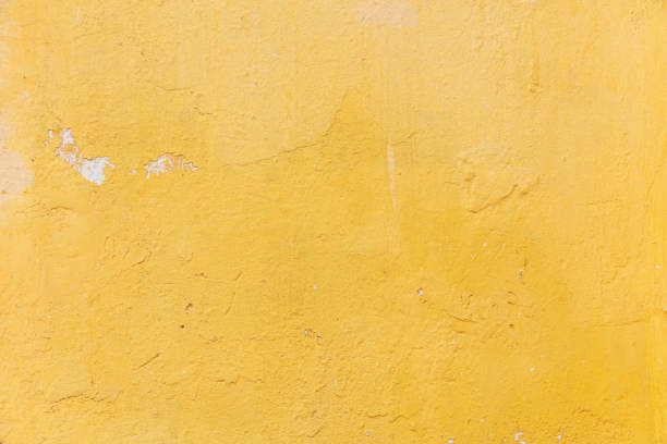 istock Bright yellow color, painted wall texture grunge background 1090068754