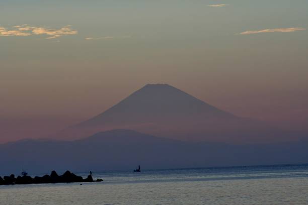 istock Mt. Fuji at Dusk: View from Miura Peninsula, Kanagawa Prefecture 1090069102