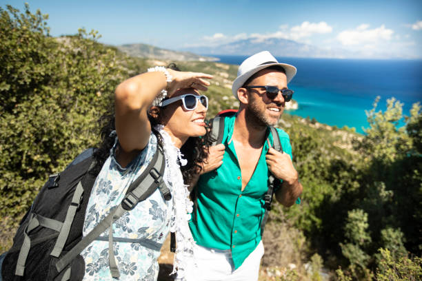 istock Tourists with backpacks hiking 1090071054