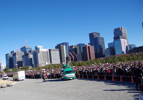 Tokyo, Japan – January 2, 2019: In Japan, New Year's celebration ceremony will be held at the Imperial Palace in New Year. That day is January 2.Many citizens gather there and celebrate with the Emperor and the Royal Family. People will shake a lot of national flags and pray for happiness. Current Emperor retires April 30, 2019. On May 1, the Crown Prince attends the Emperor. ‘Heisei’ of the Japanese era will change to a new era.