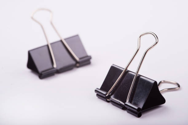 office binder clips lies on a white background