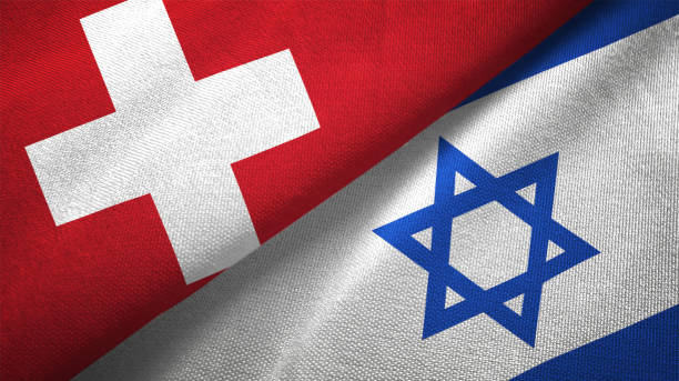 istock Israel and Switzerland two flags together realations textile cloth fabric texture 1090080840