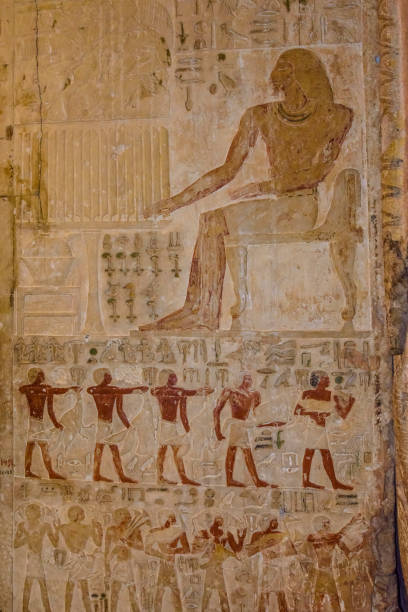 istock Egyptian ancient hieroglyphs on the stone wall 1090080886