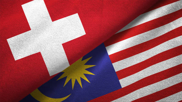 istock Malaysia and Switzerland two flags together realations textile cloth fabric texture 1090081052