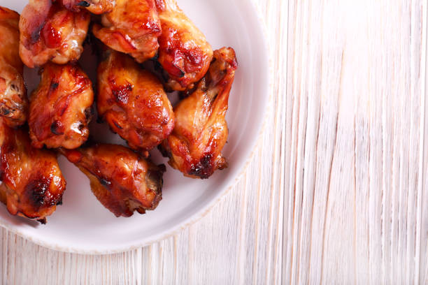 istock Roast chicken wings in a plate 1090081056