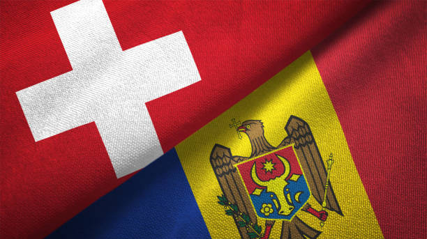 istock Moldova and Switzerland two flags together realations textile cloth fabric texture 1090081072