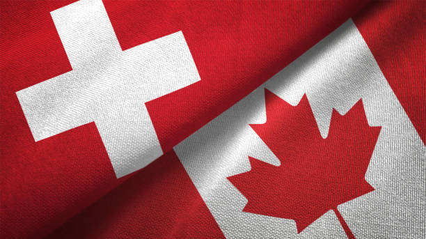 istock Canada and Switzerland two flags together realations textile cloth fabric texture 1090082714