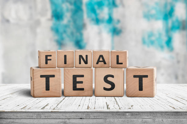 istock Final test spelled with letter cubes on a wooden table 1090083546