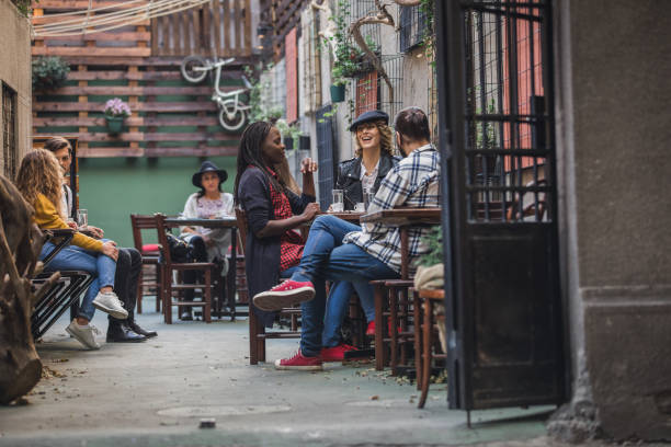istock Happy friends in coffee shop 1090084074