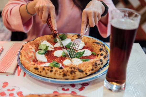 istock Eating buffalo mozzarella pizza for dinner 1090084230