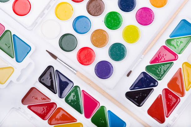istock Watercolor paints lie on a white background 1090086182