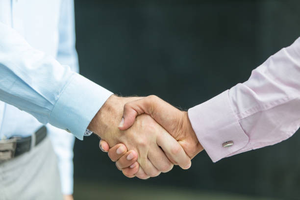 istock Handshake of business partners 1090088788