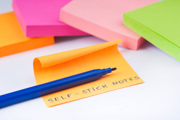 istock multicolored paper sticker on white background. Theme office 1090088814