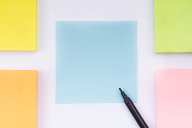 istock multicolored paper sticker on white background. Theme office 1090088842