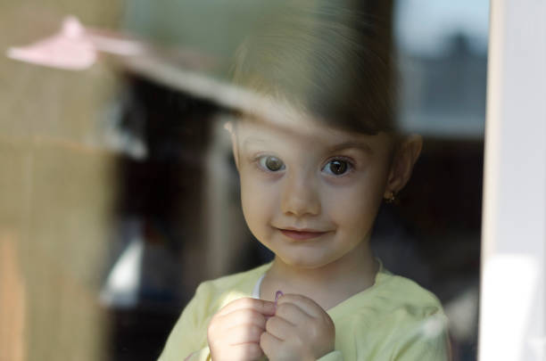 istock A cute little girl looking at you 1090101518