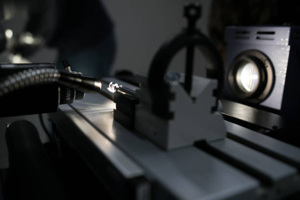 istock On the left is the drill under the microscope which is illuminated by LEDs. On the right is on the monitor displayed output of the microscope. 1090101780