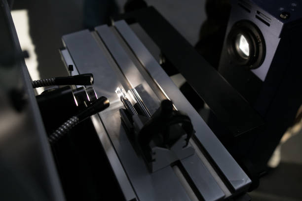 istock On the left is the drill under the microscope which is illuminated by LEDs. On the right is on the monitor displayed output of the microscope. 1090101904