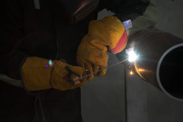 istock Worker welding the steel part by manual 1090101916