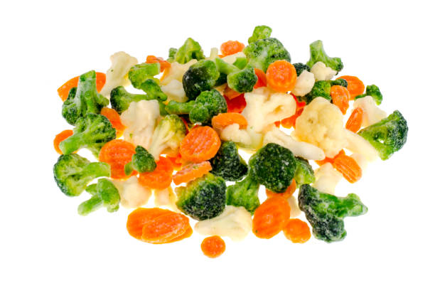 istock Frozen broccoli, cauliflower, carrots on white background 1090105522